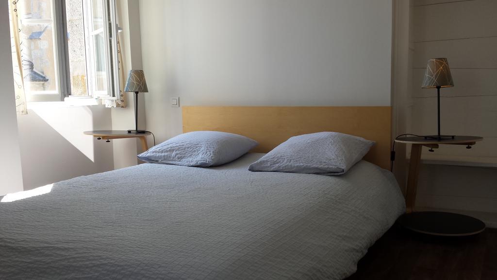 Au Pigeon Blanc Andouillé Quarto foto